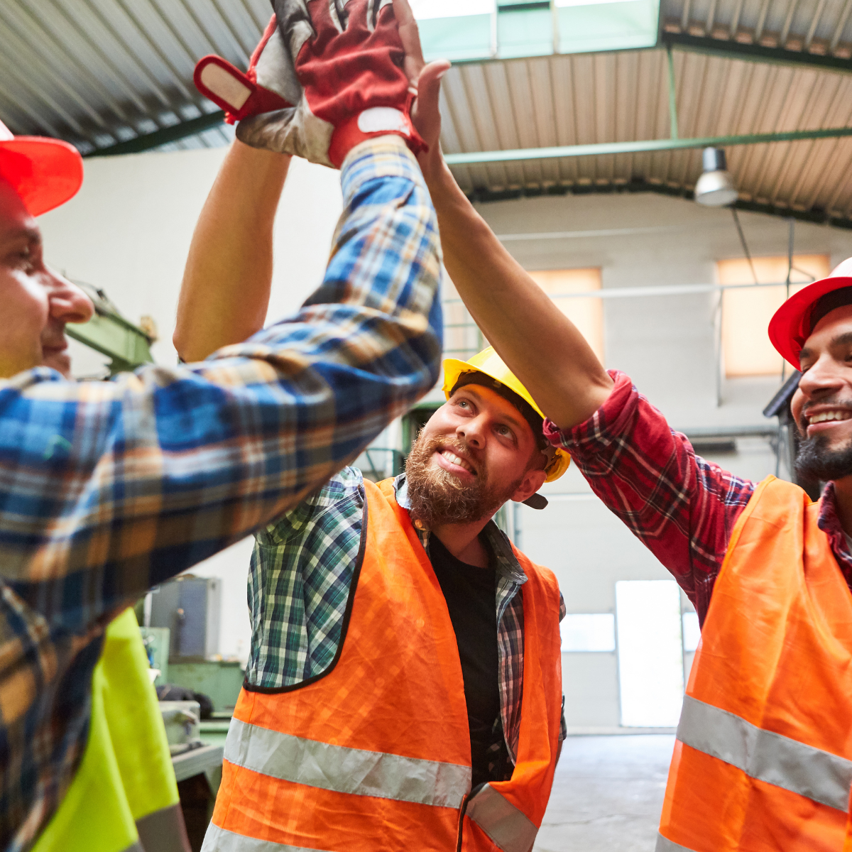 workers giving high fives