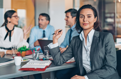 people at a table in a meeting