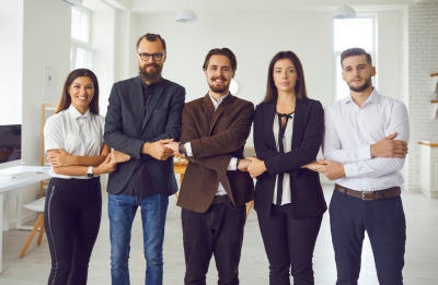 workers with arms intertwined