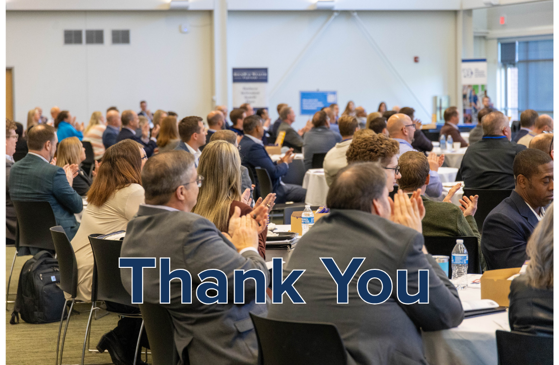 conference attendees with Thank You