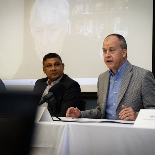 men at conference table