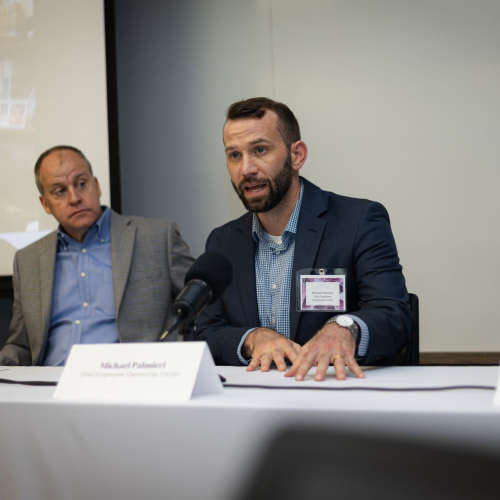 men at a conference table